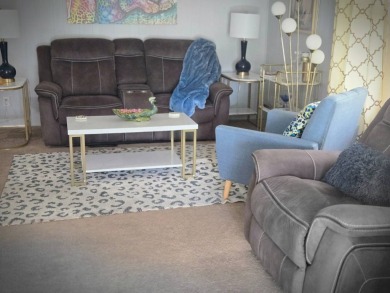 Enjoy your morning coffee or evening libation from the comfort on Rolling Greens Executive Golf Community in Florida - for sale on GolfHomes.com, golf home, golf lot
