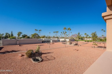Beautifully maintained end unit condo located in a guard-gated on Scottsdale Shadows in Arizona - for sale on GolfHomes.com, golf home, golf lot