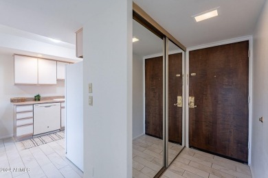 Beautifully maintained end unit condo located in a guard-gated on Scottsdale Shadows in Arizona - for sale on GolfHomes.com, golf home, golf lot