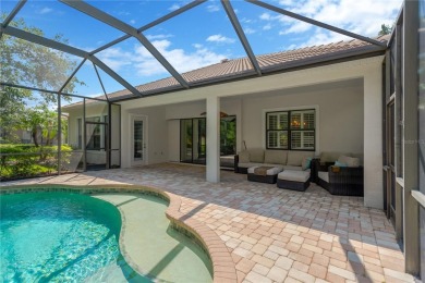 Experience exceptional Florida living at its finest in the on Lakewood Ranch Golf and Country Club in Florida - for sale on GolfHomes.com, golf home, golf lot