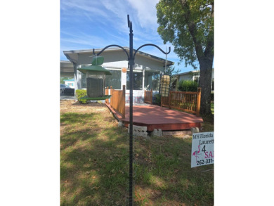 Enjoy your morning coffee or evening libation from the comfort on Rolling Greens Executive Golf Community in Florida - for sale on GolfHomes.com, golf home, golf lot