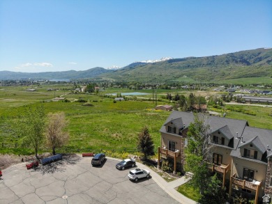 Rare turn key end-unit with unobstructed views! This beautifully on Wolf Creek Golf Club and Resort in Utah - for sale on GolfHomes.com, golf home, golf lot