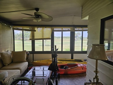 The VIEW. It's all about the View. This home needs some TLC, but on Heritage Ridge Golf Club in Florida - for sale on GolfHomes.com, golf home, golf lot