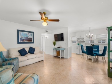 Welcome to this beautifully renovated, turn key, first-floor on The American Golf Club in Florida - for sale on GolfHomes.com, golf home, golf lot