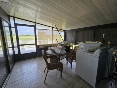 The VIEW. It's all about the View. This home needs some TLC, but on Heritage Ridge Golf Club in Florida - for sale on GolfHomes.com, golf home, golf lot