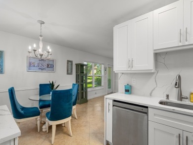 Welcome to this beautifully renovated, turn key, first-floor on The American Golf Club in Florida - for sale on GolfHomes.com, golf home, golf lot