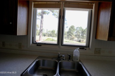 LOOKING FOR A GOLF FRONT LOCATION & EASY ACCESS TO THE COURSE? on Hyland Golf Club in North Carolina - for sale on GolfHomes.com, golf home, golf lot