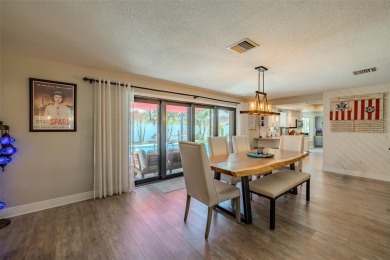 Under contract-accepting backup offers. Must-See Dunedin Pool on The Dunedin Country Club in Florida - for sale on GolfHomes.com, golf home, golf lot