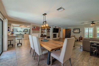 Under contract-accepting backup offers. Must-See Dunedin Pool on The Dunedin Country Club in Florida - for sale on GolfHomes.com, golf home, golf lot