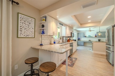 Under contract-accepting backup offers. Must-See Dunedin Pool on The Dunedin Country Club in Florida - for sale on GolfHomes.com, golf home, golf lot