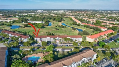 Breathtaking 2 bedroom, 2 bathroom corner unit with view on Flamingo Lakes Country Club in Florida - for sale on GolfHomes.com, golf home, golf lot