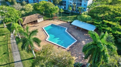 Breathtaking 2 bedroom, 2 bathroom corner unit with view on Flamingo Lakes Country Club in Florida - for sale on GolfHomes.com, golf home, golf lot