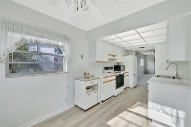 Breathtaking 2 bedroom, 2 bathroom corner unit with view on Flamingo Lakes Country Club in Florida - for sale on GolfHomes.com, golf home, golf lot