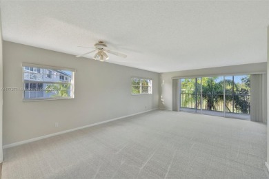Breathtaking 2 bedroom, 2 bathroom corner unit with view on Flamingo Lakes Country Club in Florida - for sale on GolfHomes.com, golf home, golf lot
