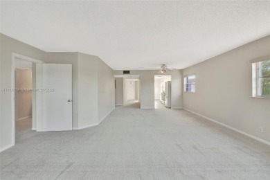 Breathtaking 2 bedroom, 2 bathroom corner unit with view on Flamingo Lakes Country Club in Florida - for sale on GolfHomes.com, golf home, golf lot