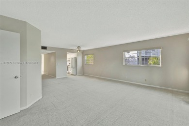 Breathtaking 2 bedroom, 2 bathroom corner unit with view on Flamingo Lakes Country Club in Florida - for sale on GolfHomes.com, golf home, golf lot