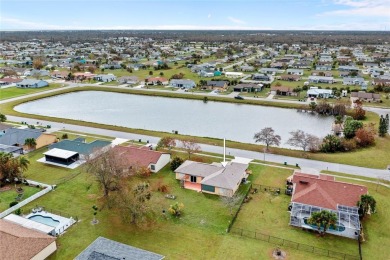 Welcome to Gardens of Gulf Cove! This delightful 3-bedroom on Duffys Golf Center in Florida - for sale on GolfHomes.com, golf home, golf lot