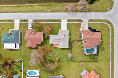 Welcome to Gardens of Gulf Cove! This delightful 3-bedroom on Duffys Golf Center in Florida - for sale on GolfHomes.com, golf home, golf lot