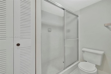 Breathtaking 2 bedroom, 2 bathroom corner unit with view on Flamingo Lakes Country Club in Florida - for sale on GolfHomes.com, golf home, golf lot