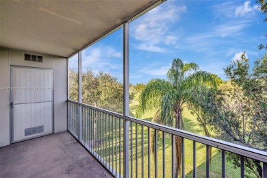 Breathtaking 2 bedroom, 2 bathroom corner unit with view on Flamingo Lakes Country Club in Florida - for sale on GolfHomes.com, golf home, golf lot