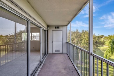 Breathtaking 2 bedroom, 2 bathroom corner unit with view on Flamingo Lakes Country Club in Florida - for sale on GolfHomes.com, golf home, golf lot