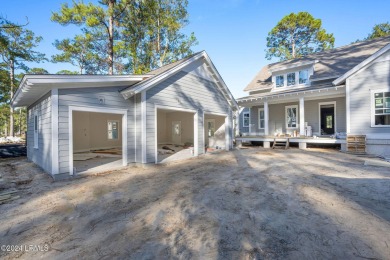 This charming Lowcountry home combines Southern style porches on Oldfield Golf Club in South Carolina - for sale on GolfHomes.com, golf home, golf lot