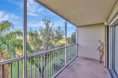 Breathtaking 2 bedroom, 2 bathroom corner unit with view on Flamingo Lakes Country Club in Florida - for sale on GolfHomes.com, golf home, golf lot