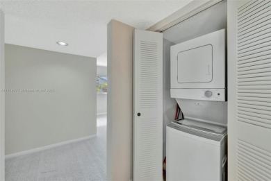 Breathtaking 2 bedroom, 2 bathroom corner unit with view on Flamingo Lakes Country Club in Florida - for sale on GolfHomes.com, golf home, golf lot