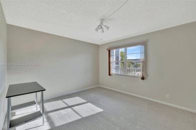 Breathtaking 2 bedroom, 2 bathroom corner unit with view on Flamingo Lakes Country Club in Florida - for sale on GolfHomes.com, golf home, golf lot