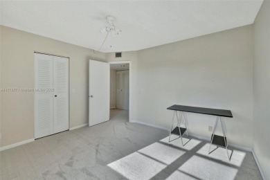Breathtaking 2 bedroom, 2 bathroom corner unit with view on Flamingo Lakes Country Club in Florida - for sale on GolfHomes.com, golf home, golf lot