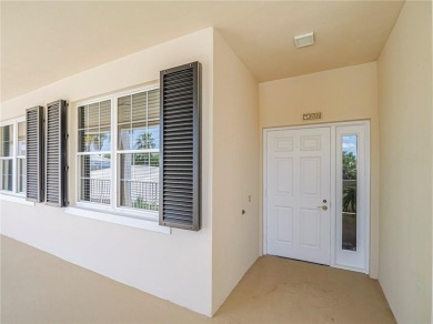 Elegant Country Club living in this second floor condo built by on Oak Harbor Country Club in Florida - for sale on GolfHomes.com, golf home, golf lot