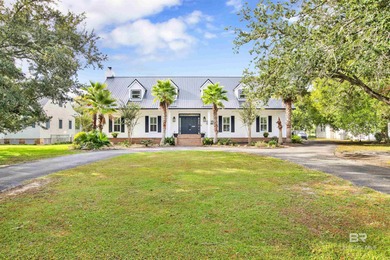 Welcome to this expansive 6-bedroom, 4.5-bath home perfectly on The Golf Club of the Wharf in Alabama - for sale on GolfHomes.com, golf home, golf lot