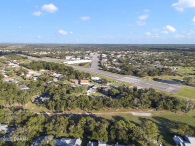 Welcome to Spruce Creek Fly-In, a premier aviation community on Spruce Creek Golf Club in Florida - for sale on GolfHomes.com, golf home, golf lot