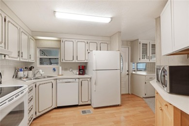 This beautifully maintained 2-bedroom, 2-bath home is located in on Maple Leaf Golf and Country Club in Florida - for sale on GolfHomes.com, golf home, golf lot