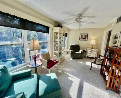 This beautifully maintained end-unit condo features two spacious on On Top Of The World Golf Course in Florida - for sale on GolfHomes.com, golf home, golf lot