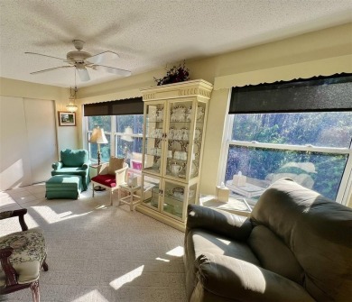 This beautifully maintained end-unit condo features two spacious on On Top Of The World Golf Course in Florida - for sale on GolfHomes.com, golf home, golf lot