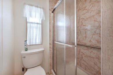 This beautifully maintained 2-bedroom, 2-bath home is located in on Maple Leaf Golf and Country Club in Florida - for sale on GolfHomes.com, golf home, golf lot