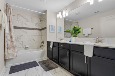 Get ready to fall in love with this fully furnished 5-bedroom on The Oasis Club at Champions Gate in Florida - for sale on GolfHomes.com, golf home, golf lot