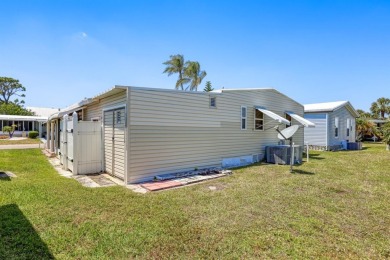 This beautifully maintained 2-bedroom, 2-bath home is located in on Maple Leaf Golf and Country Club in Florida - for sale on GolfHomes.com, golf home, golf lot