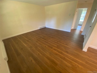 Welcome to 393 A Woodbridge Dr. nestled in desirable 55+ 24 hour on Leisure Village Golf Course in New York - for sale on GolfHomes.com, golf home, golf lot