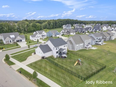 Discover your dream home in this stylish, modern farmhouse on a on Railside Golf Club in Michigan - for sale on GolfHomes.com, golf home, golf lot