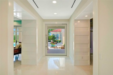 Beautifully renovated home in Orchid Island overlooking the 11th on Orchid Island Golf and Beach Club in Florida - for sale on GolfHomes.com, golf home, golf lot