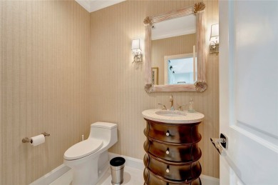 Beautifully renovated home in Orchid Island overlooking the 11th on Orchid Island Golf and Beach Club in Florida - for sale on GolfHomes.com, golf home, golf lot