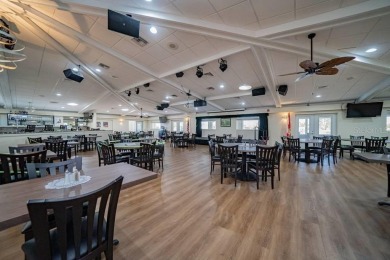 This beautifully maintained 2-bedroom, 2-bath home is located in on Maple Leaf Golf and Country Club in Florida - for sale on GolfHomes.com, golf home, golf lot