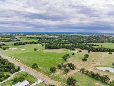 Beautiful acreage in prime location. With almost 900 ft of road on Decatur Golf and Country Club in Texas - for sale on GolfHomes.com, golf home, golf lot