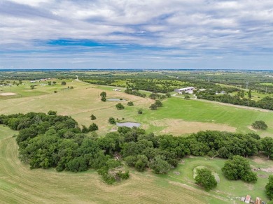 Beautiful acreage in prime location. With almost 900 ft of road on Decatur Golf and Country Club in Texas - for sale on GolfHomes.com, golf home, golf lot