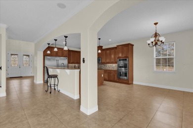 Welcome to this stunning home nestled in the highly sought-after on Wedgefield Golf Club in Florida - for sale on GolfHomes.com, golf home, golf lot