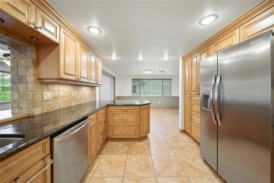 Lovely and spacious, this 2-bedroom, 2-bathroom home with a on Beacon Woods Golf Club in Florida - for sale on GolfHomes.com, golf home, golf lot