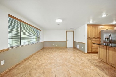 Lovely and spacious, this 2-bedroom, 2-bathroom home with a on Beacon Woods Golf Club in Florida - for sale on GolfHomes.com, golf home, golf lot