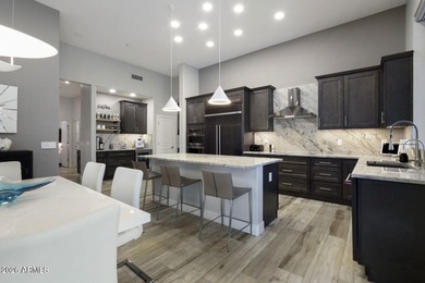 Perfectly located in the heart of Scottsdale, this residence on Starfire At Scottsdale Country Club in Arizona - for sale on GolfHomes.com, golf home, golf lot